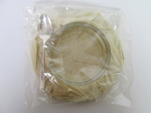 Small Glass Dish with small silver serving spoon Sealed in plastic