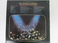 The Doobie Brothers What Were Once Vices Are Now Habits Record Album with Poster