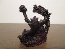 Red Resin Dragon Holding an Orb